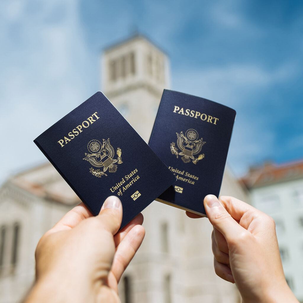 Two People Holding Their Passports