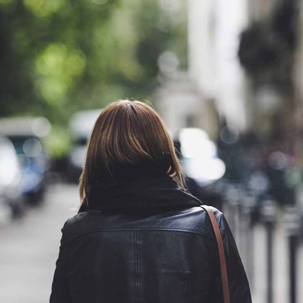 Woman Walking Down the Street