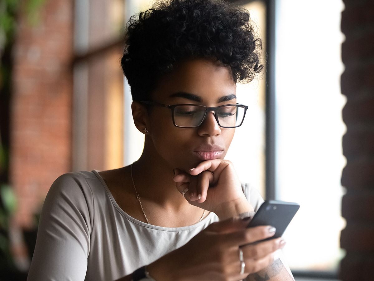 Woman reading a guarantee on a law firms website