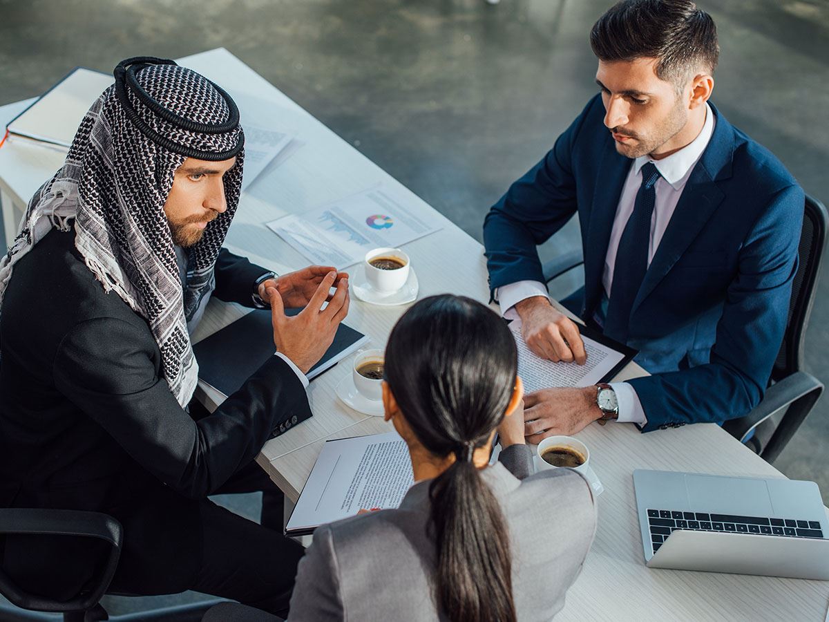 Translator with a client and lawyer meeting