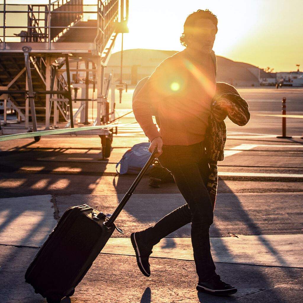 Man Traveling With Suitcase