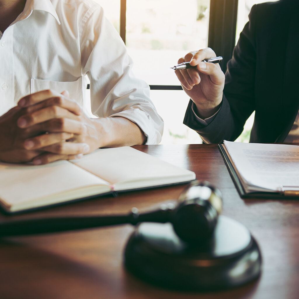 Two People With Documents